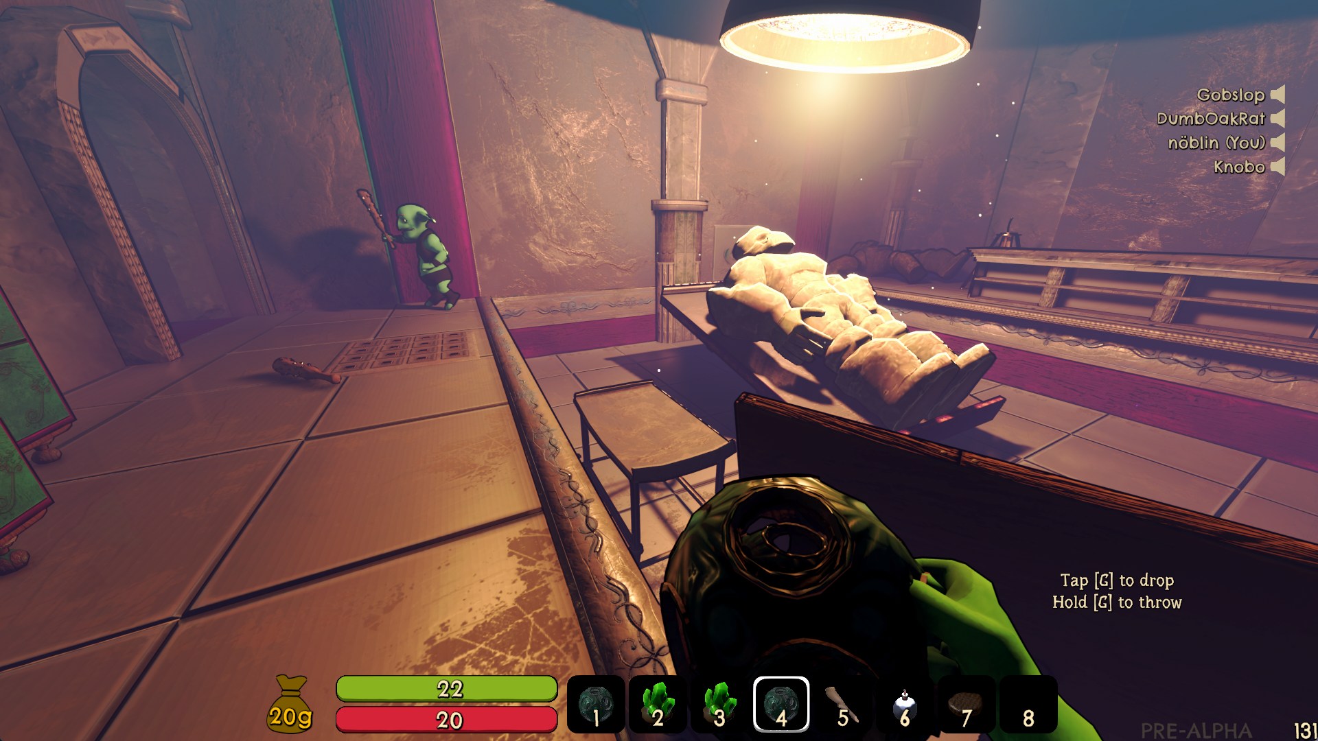Player and another goblin in a magic laboratory with a golem on a surgeon table and a spike trap on the floor